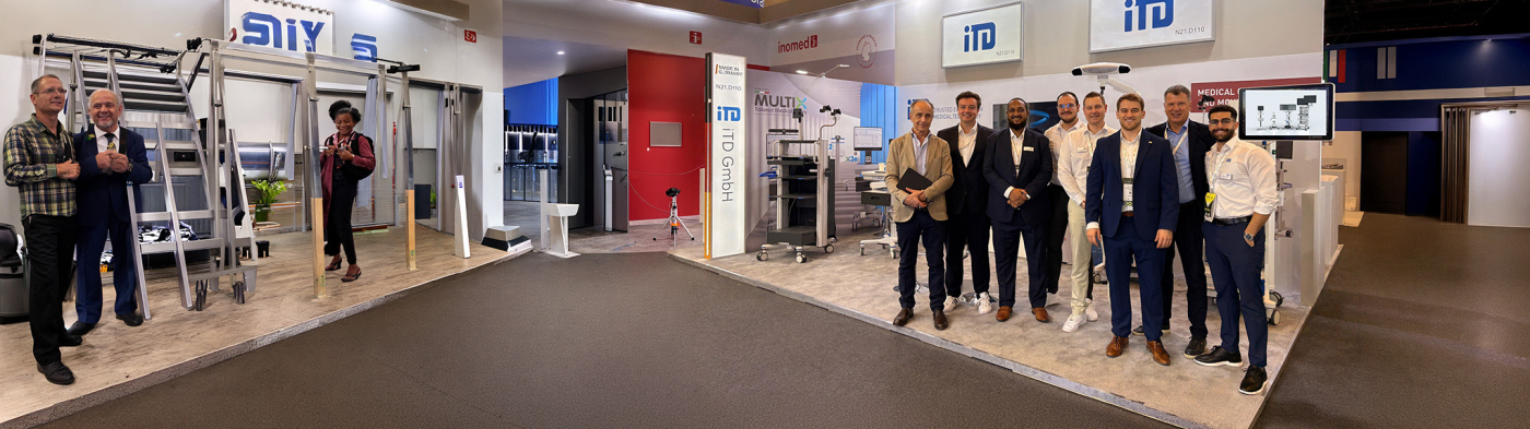 iTD booth at fair with many visitors