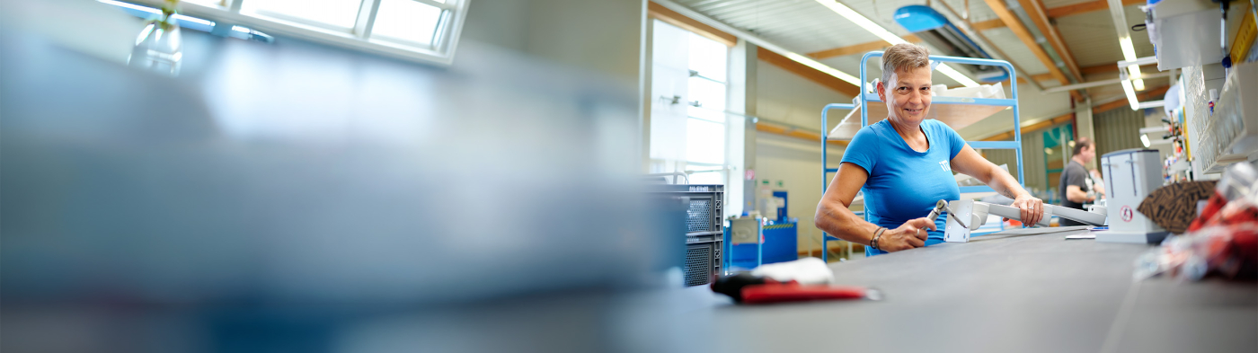 A production worker mount medical arms